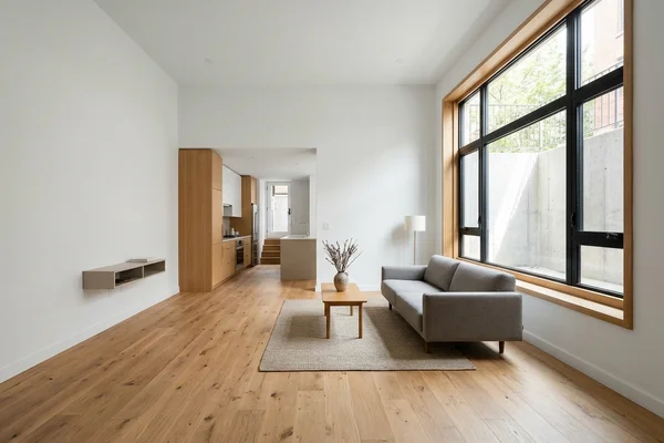 Basement dwelling unit with full ceiling height and egress window